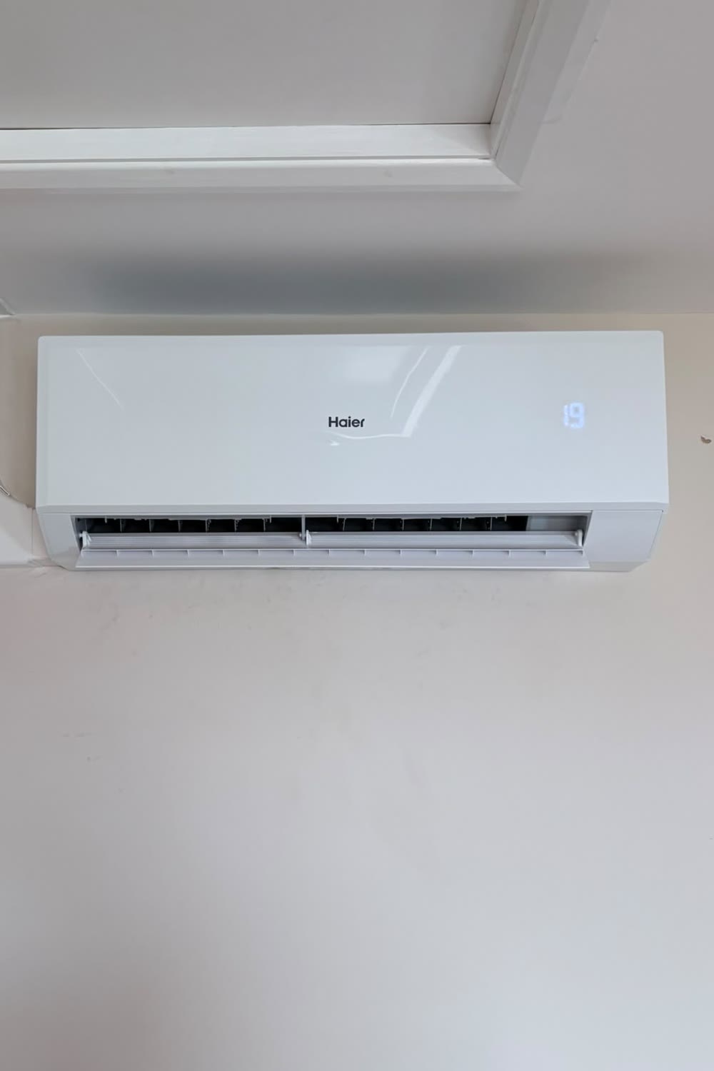 The matching Haier indoor wall unit fitted inside the same property